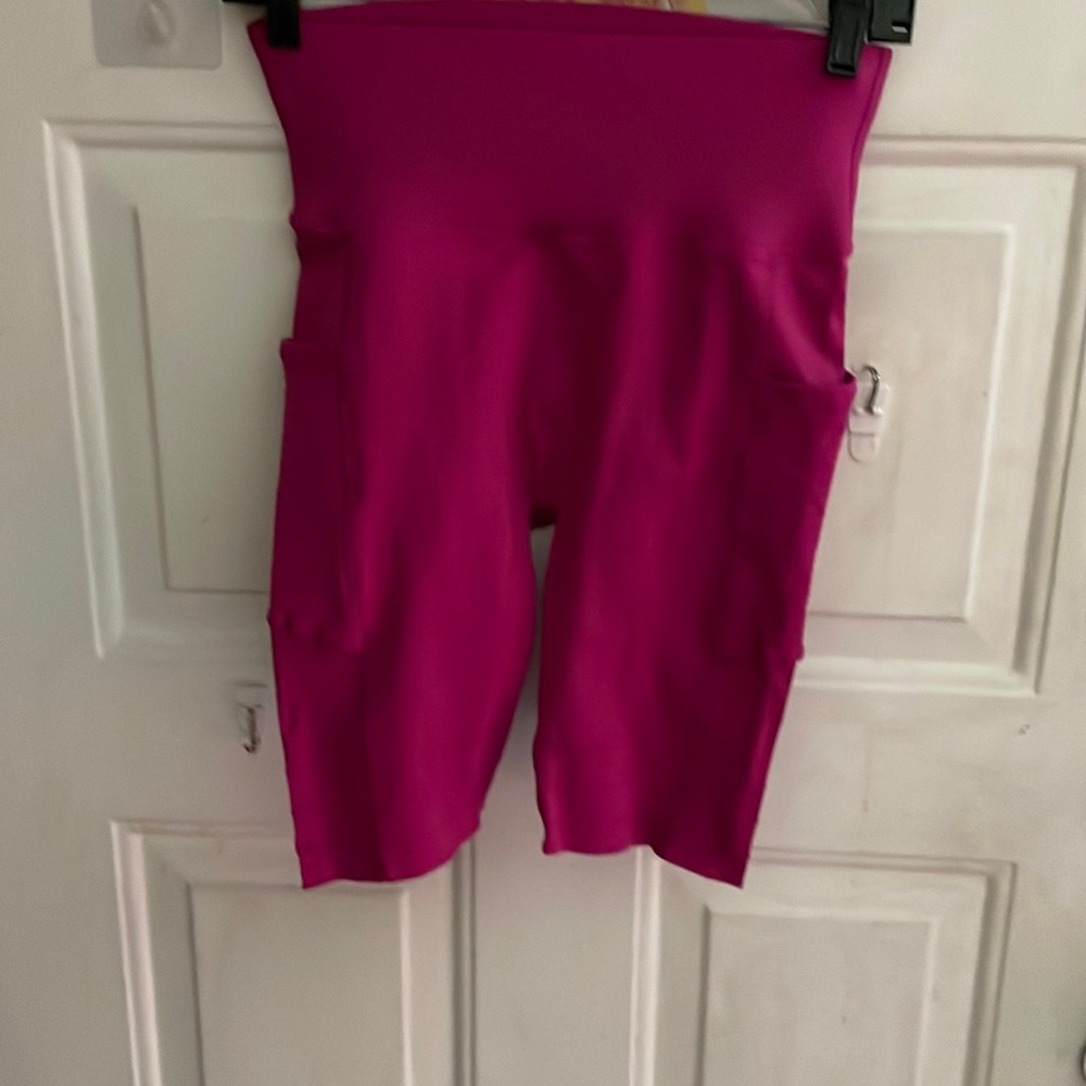 Never worn hot pink biking short